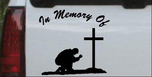 In Memory Of Man Kneeling At Cross