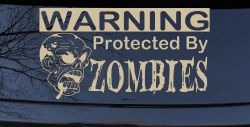 Protected By Zombies Funny Car or Truck Window Decal Sticker (Desert Sand)